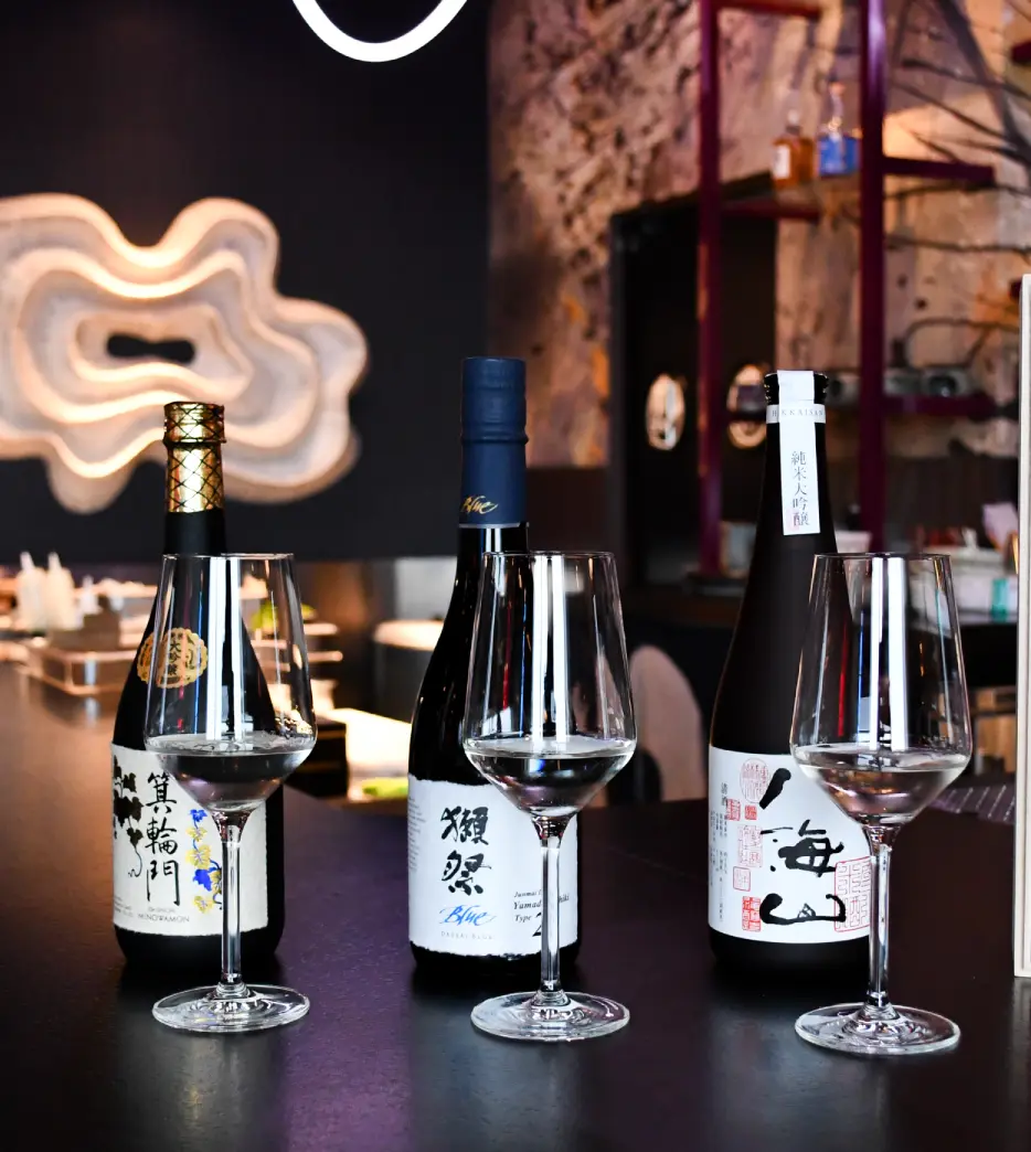 A sake pairing poured for the Omakase experience